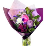 Beautiful flower arrangement featuring mums and disbuds in a decorative box
