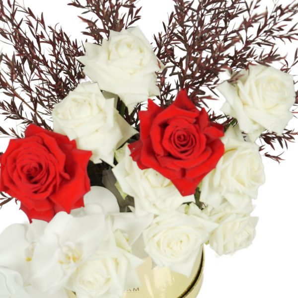 A bouquet of roses and orchids, symbolising elegance and sophistication.