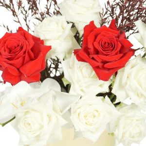 A bouquet of roses and orchids, symbolising elegance and sophistication.